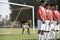 Soccer Players Standing In A Row Preparing For Free Kick