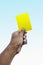 Soccer referee giving yellow card