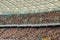 Soccer stadium inside view. football field, empty stands, a crowd of fans, a roof against the sky