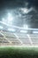 Soccer stadium. Professional sport arena. Night stadium under the moon with lights, fans and flags. Vertical background