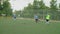 Soccer striker getting failed by hitting goal post outdoors at dawn