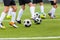 Soccer Training; Football Soccer Training Drills: Young Players Practicing Soccer Run with Ball
