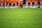 Soccer Training Pitch. Football Players Standing in Line on Training Field