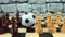 Soccerball among black-and-white pawns