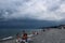 Sochi, Russia, 08/07/2020 - beach with people stormy weather dark sky