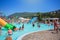 Sochi, Russia, 08.14.2019: Many different slides and attractions in the children`s pool in the aquapark