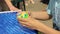 Sochi, Russia - August 10, 2019: teenager hands collecting Rubik Cube. Male hands architect Rubik Cube. Young man trying