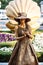 SOCHI, RUSSIA - June 5, 2018: living statue young woman painted in gold