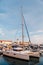 SOCHI, RUSSIA - June 5, 2018: Sailing Yachts And Private Boats Moored At Pier In Sochi Seaport  at sunset. Grand Marina Station Co