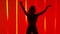 Social dancing. Energetic young woman practicing salsa sharp movements. Silhouette of a dancer in the studio against a