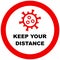 Social distancing during COVID-19 pandemic, sign with coronavirus icon and warning info. Keep precaution and your distance in