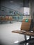 Social distancing signs on soft luxury leather upholstery seats in empty airport passenger`s waiting room selective focus on the s