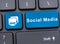 Social media on blue button on keyboard