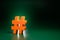 Social Media Concept: An orange colored backlit hashtag on a green seamless background