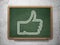 Social network concept: Thumb Up on chalkboard