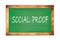 SOCIAL  PROOF text written on green school board