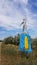 Social realism monument in Odessa countryside of Ukraine. Monumental sculpture of Social-Realism with clouds background.