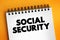 Social Security text on notepad, concept background