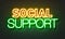 Social support neon sign on brick wall background.