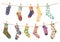 Socks on rope. Cotton sock with cute pattern hanging and drying on laundry ropes. Various funny socks with clothespins