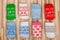 Socks of various colors with nordic ornament on wooden background