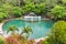 Soda Swimming Pool. Swimming pool in tropical forest on Camigin Island, Philippines.