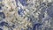 Sodalite Blue and White and Metallic Stone Background