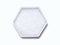 Sodium Hydroxide Pellets in hexagonal molecular shaped container on white background. Top View