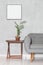 Sofa, frame, corner table and plant