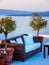 Sofa on terrasse. Amazing Santorini island sea view. Greece