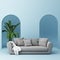 Sofa wiht pot plant and blue arch wall interior space