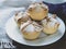 Soffioni Abruzzesi - Italian cupcakes or muffins filled with Ricotta cream. Sweet Ricotta pastries. Classic Italian dessert