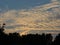 A soft baby blanket of clouds at dusk