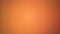 Soft beautiful orange-peach tone. A sheet of paper with different lighting. Lighter in the middle. It can be used as a background