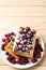 Soft Belgian waffles with blueberry, raspberry, blackcurrant and