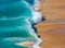 Soft blue ocean wave on sandy beach. Background