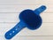 Soft blue rubber massage brush for animals. Pet care accessories