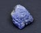 Soft blue violet rough TANZANITE from Tanzania isolated on black