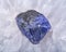 Soft blue violet rough TANZANITE from Tanzania placed on a crystalline druzy center of Polished Large Natural Blue Lace Agate