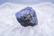 Soft blue violet rough TANZANITE from Tanzania placed on a crystalline druzy center of Polished Large Natural Blue Lace Agate