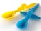 Soft blue and yellow silicone spoons with aircraft for child