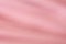 Soft blurred sweet pink fabric texture background