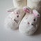 Soft brown color slippers on carpet