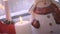 Soft burning christmas candle and cute snowman