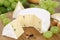 Soft cheese like Camembert or Brie on a wooden board
