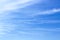 Soft clouds sky on bright blue with vast space background