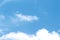 Soft clouds on vast bright bluesky background with breeze