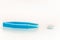 Soft contact lens with blue plastic tweezers