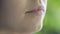 Soft cute woman lips, gentle female lower face extreme close-up, sweet teen skin