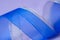 Soft defocused background blue silver ribbon on violet